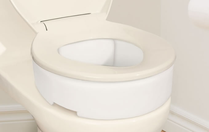 Toilet Seat Riser with Hinge, by AquaSense®, on toilet